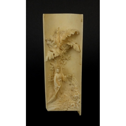 788 - Oriental carved ivory section depicted a geisha girl before a tree, 17cm high