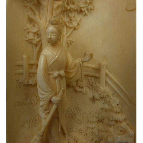 788 - Oriental carved ivory section depicted a geisha girl before a tree, 17cm high