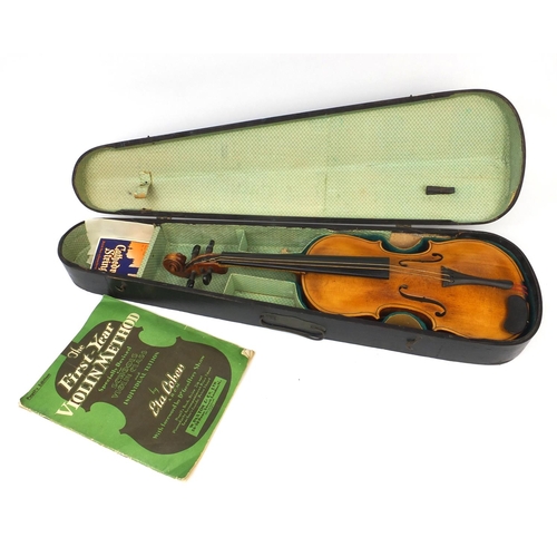 543 - Old wooden violin with two piece back, bearing a Richard Peat label together with fitted case, the v... 