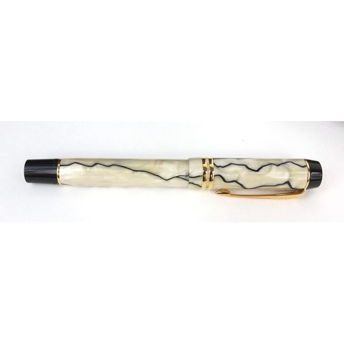 303 - Boxed Parker duofold marbleised fountain pen with 18k gold nib, made in the UK, the fountain pen 13.... 