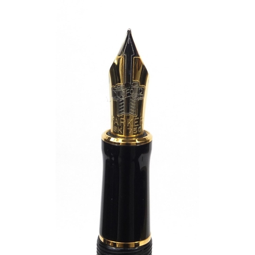 305 - Boxed Parker duofold black fountain pen with 18k gold nib, made in UK, 13.5cm long