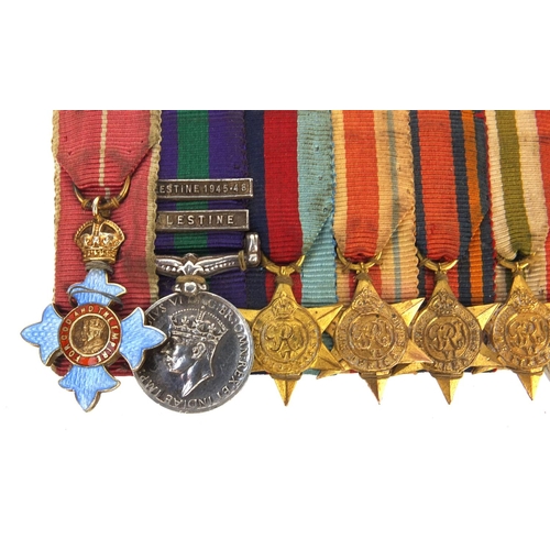 582 - British Military interest dress medal group comprising The Order of The British Empire, Palestine me... 