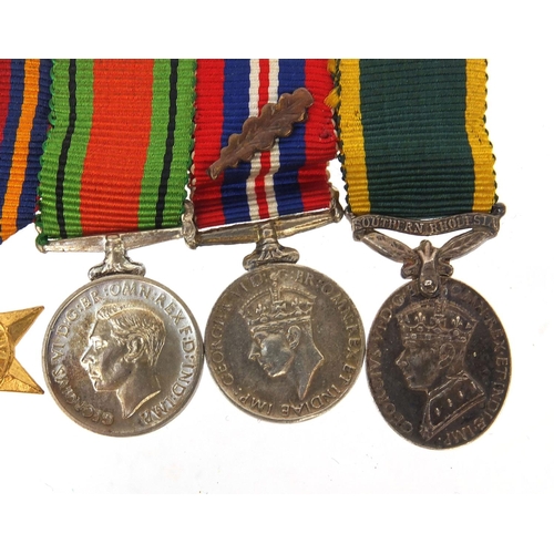 584 - British Military interest World War II dress medal group comprising The 1939-45 War medal with Oak L... 