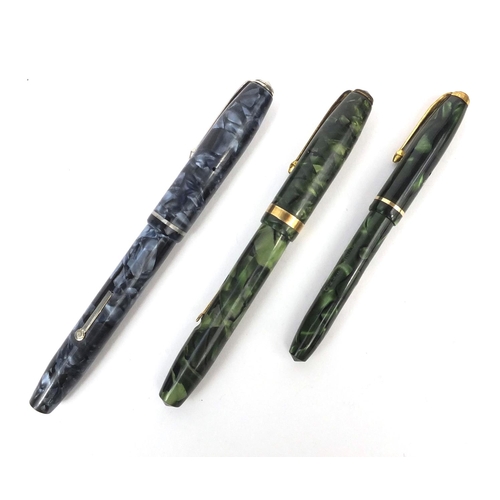 323 - Three Conway Stewart marbleised fountain pens comprising a Conway Stewart 75, Conway Stewart 84 and ... 