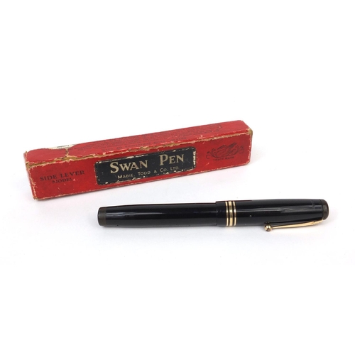 320 - Boxed Swan 2060 oversized black fountain pen with Swan No.6 14ct gold nib, the fountain pen 13cm lon... 