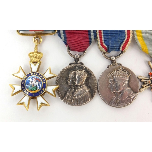 583 - British Military interest dress medal group including 1937 commemorative medal and 1910-1935, etc