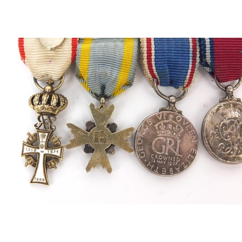 583 - British Military interest dress medal group including 1937 commemorative medal and 1910-1935, etc