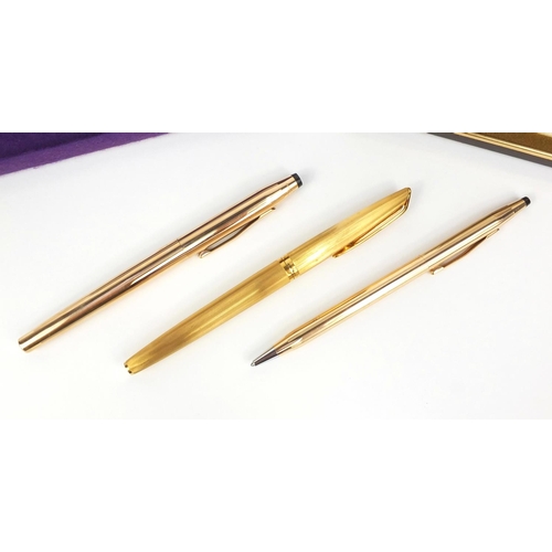 318 - Boxed cross 14kt rolled gold fountain pen and ball point pen with accessories, together with a boxed... 