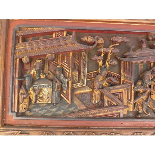 814 - Pair of Chinese wooden panels carved with figures in a palace setting, each 28cm high x 50cm wide