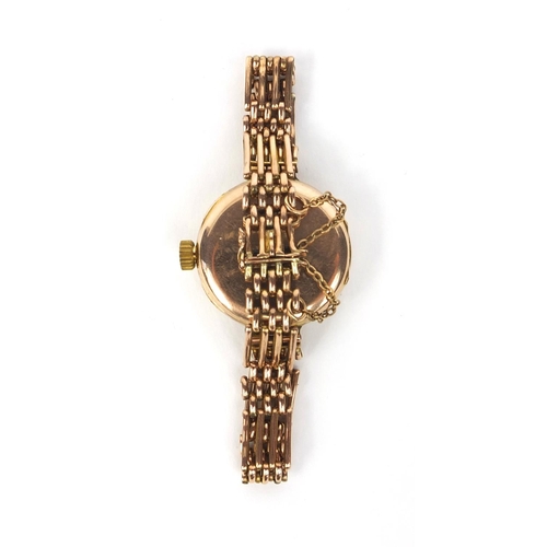 1242 - 9ct gold Rolex wristwatch with 9ct gold strap, the watch 2.8cm in diameter, approximate weight 24.3g