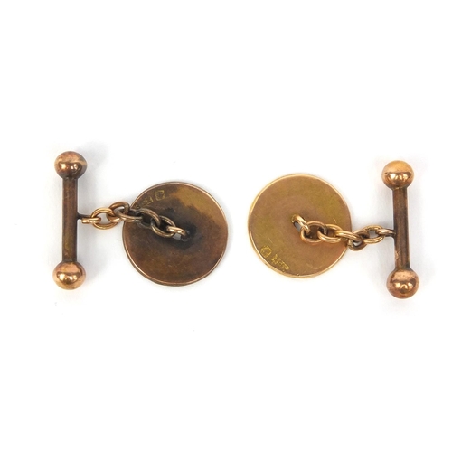 795A - Pair of Chinese gold cufflinks each decorated with four character marks, each with marks to the reve... 
