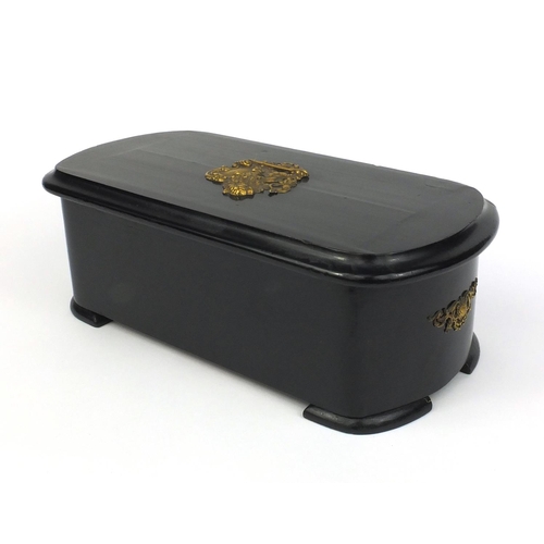 540 - Ebonised Swiss music box with gilt metal mounts, the hinged lid with applied gilt lion plaque openin... 