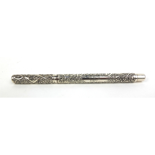 319 - Sterling silver Swan fountain pen by Mabie Todd, with embossed floral decoration, 13.5cm long