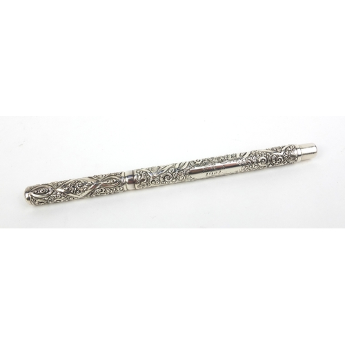 319 - Sterling silver Swan fountain pen by Mabie Todd, with embossed floral decoration, 13.5cm long