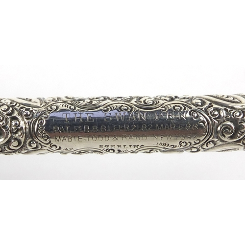 319 - Sterling silver Swan fountain pen by Mabie Todd, with embossed floral decoration, 13.5cm long