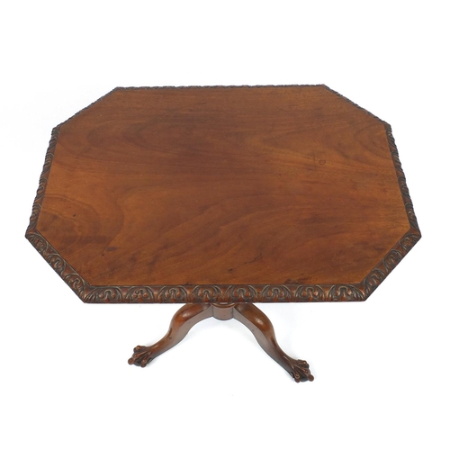 2027 - Walnut occasional table with octagonal top above a spiral twist column carved from one piece of wood... 