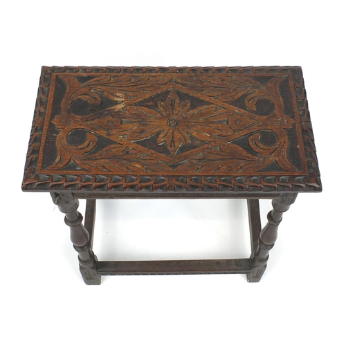 2035 - Antique oak joint stool the top carved with lozenge and leaves on baluster turned legs, 53cm high x ... 
