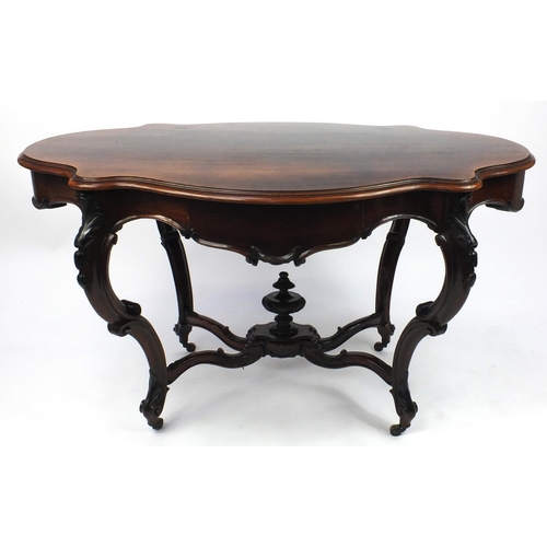 2024 - Victorian rosewood centre table with shaped top above a drawer and carved legs, 76cm high x 148cm wi... 