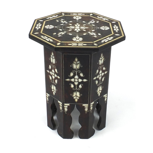 2050 - Middle Eastern octagonal hardwood occasional table with metal and Mother of Pearl inlay decorated wi... 