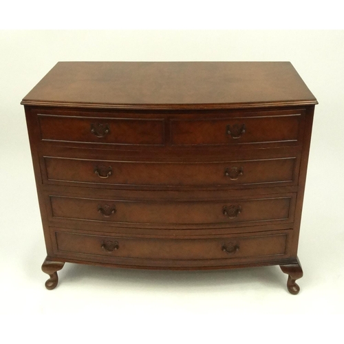 2039 - Walnut bow fronted five drawer chest with quarter veneered top, raised on cabriole feet, 76cm high x... 