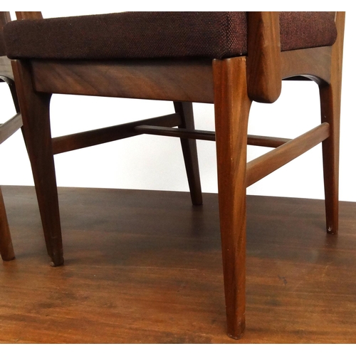 2020 - 1970's Youngers teak dining room suite comprising a table and six chairs including two carvers, a ha... 