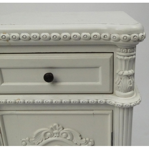 2045 - Pair of cream night stands each fitted with a drawer above a cupboard door, each 67cm high