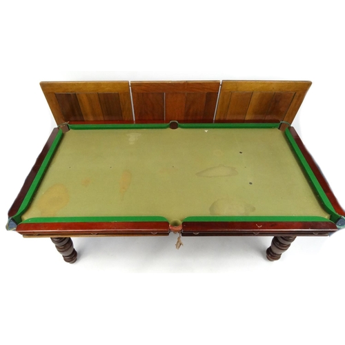 2051 - E.J. Riley quarter sized snooker table with walnut cover and slate bed, raised on turned and fluted ... 