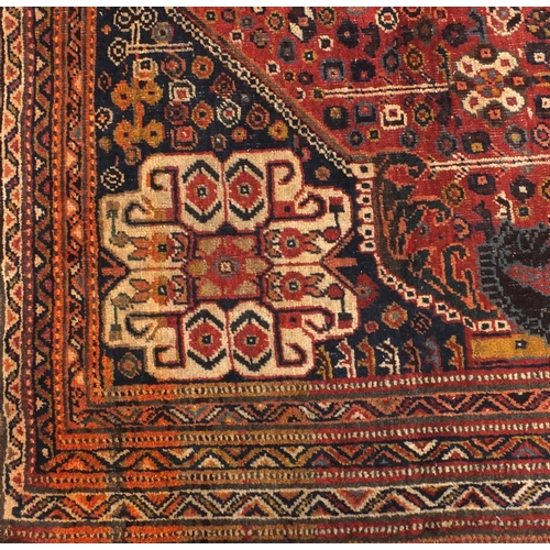 2003a - Rectangular Persian Qashqai rug, profusely decorated with flowers amongst a geometric boarder, 220cm... 