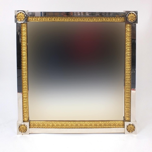 2016 - Good quality chrome and gilt mirror with the corners decorated with rosettes, 130cm x 130cm