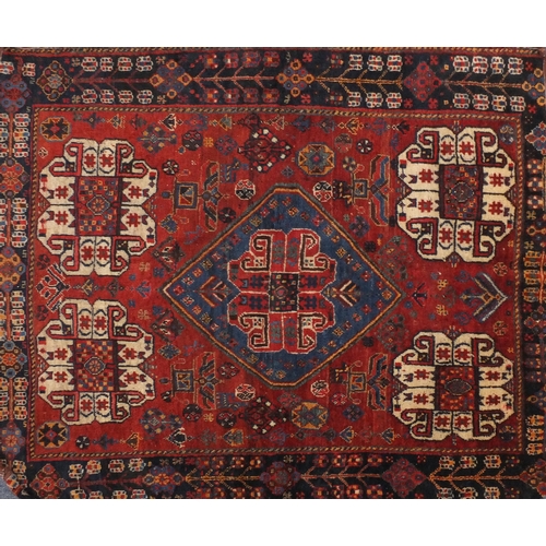 2049a - Rectangular Persian Qashqai rug, the central field and boarder with a geometric flower and tree desi... 