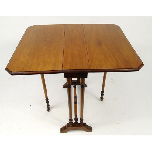 16 - Edwardian mahogany Sutherland table on turned legs, 83cm high