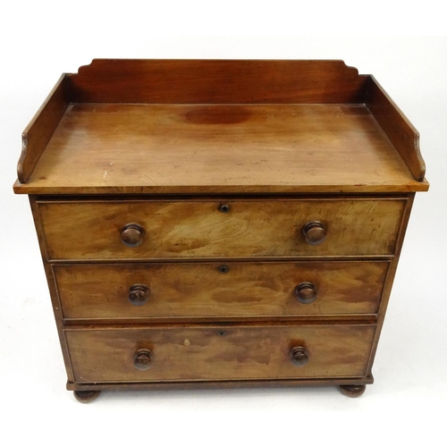 56 - Victorian mahogany three drawer chest with galleried top, 91cm high x 95cm wide x 53cm deep