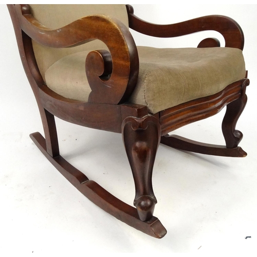 8 - Victorian mahogany rocking chair with beige upholstery