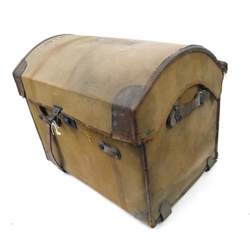 22 - Canvas dome topped trunk possibly Military with label for John Barker & Co, Kensington, London, 84cm... 