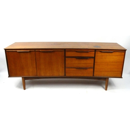 52 - Morris of Glasgow teak sideboard fitted with an arrangement of drawers and cupboard doors, 73cm high... 