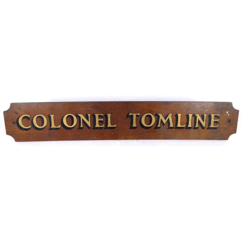 621 - Colonel Tomline - painted wooden advertising sign, 104cm x 18cm