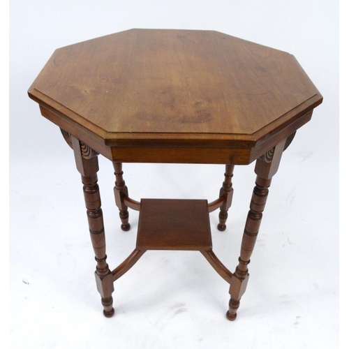 39 - Octagonal walnut occasional table with under tier, 73cm high x 60cm in diameter