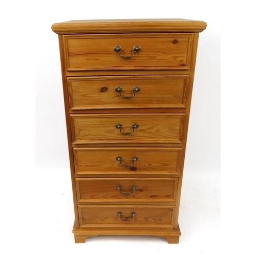 42 - Pine six drawer chest, 116cm high x 60cm wide x 46cm deep