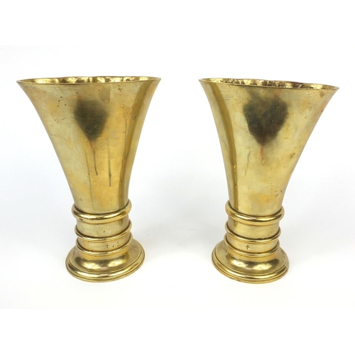 130 - Pair of ecclesiastical bronze altar vases, cross mark to the back, each 22cm high