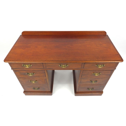 2011 - Victorian mahogany twin pedestal knee hole desk, fitted with an arrangement of nine drawers, 67cm hi... 