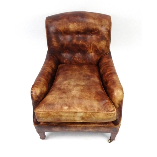 2010 - * AMENDED DESCRIPTION 2/12/16 * Howard & Sons leather club chair raised on mahogany tapering legs an... 