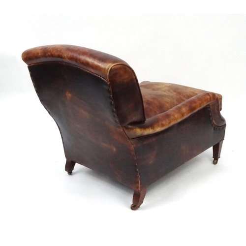 2010 - * AMENDED DESCRIPTION 2/12/16 * Howard & Sons leather club chair raised on mahogany tapering legs an... 