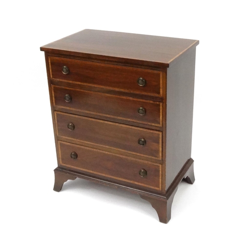 2033 - Edwardian inlaid mahogany four drawer chest on bracket feet, 76cm high x 61cm wide x 37cm deep
