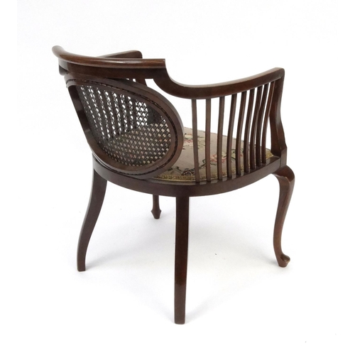 2043 - Edwardian inlaid mahogany tub chair with cane back and needlepoint seat, 71cm high