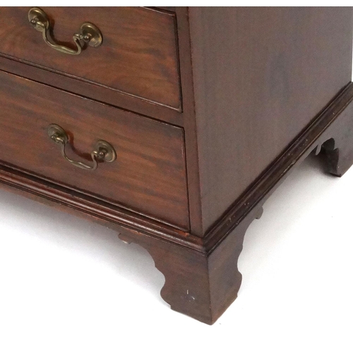 2005 - Georgian mahogany chest fitted with four graduated cock beaded drawers on bracket feet with brass sw... 