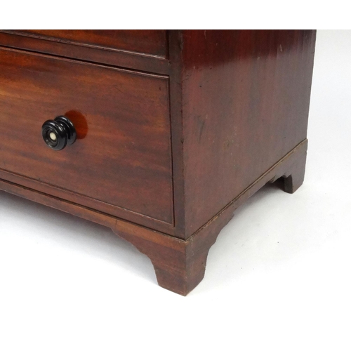 2001 - Early Victorian mahogany chest, fitted with two short drawers above three long drawers, with turned ... 