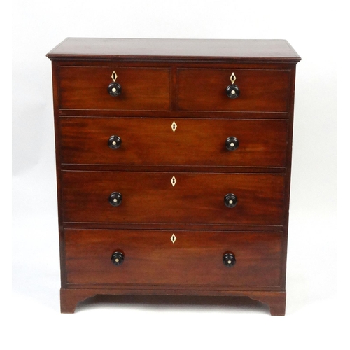 2001 - Early Victorian mahogany chest, fitted with two short drawers above three long drawers, with turned ... 