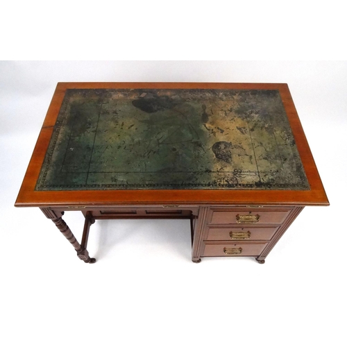 2025 - Late Victorian walnut writing table, with tooled leather top above an arrangement of five drawers an... 