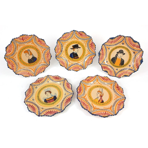 2318 - Group of five Quimper pottery plates, each hand painted with Traditional figures, each 25cm in diame... 