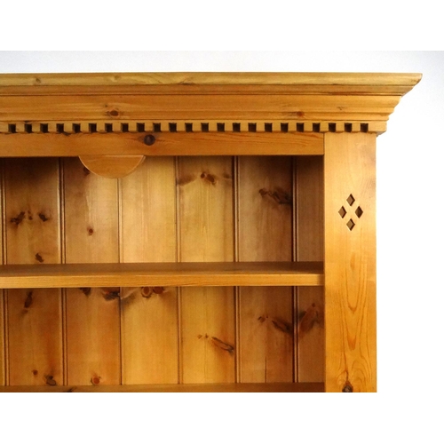 2048 - Good quality pine bookcase with five adjustable shelves and pierced pilasters, 195cm high x 95cm wid... 
